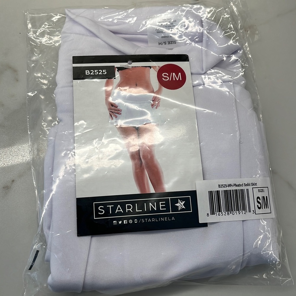 Brand new Starline mini white skirt. Never worn w/tags still in package S/M